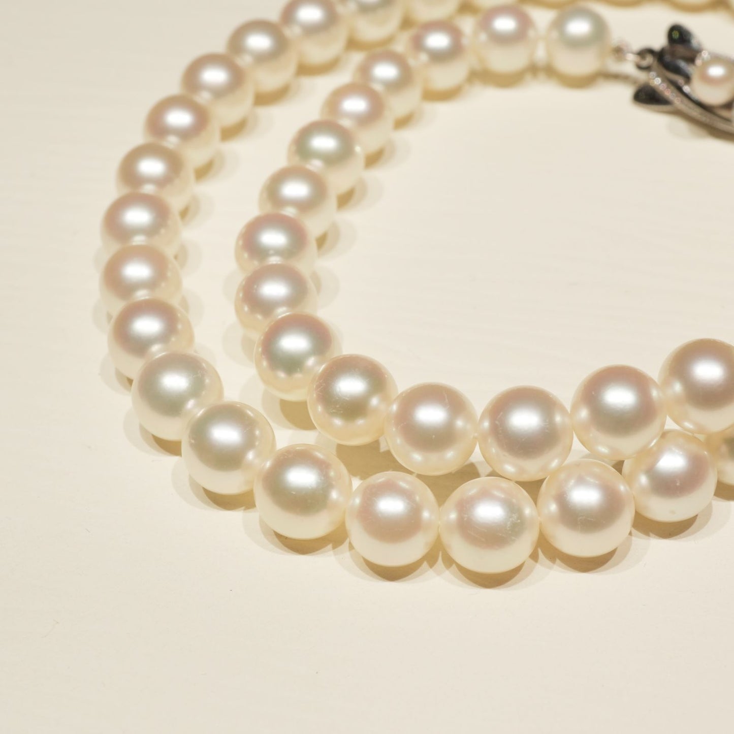 Mikimoto K14WG Akoya Pearl Necklace featuring white pearls sized 6.6 to 6.9 mm on a sterling white gold chain
