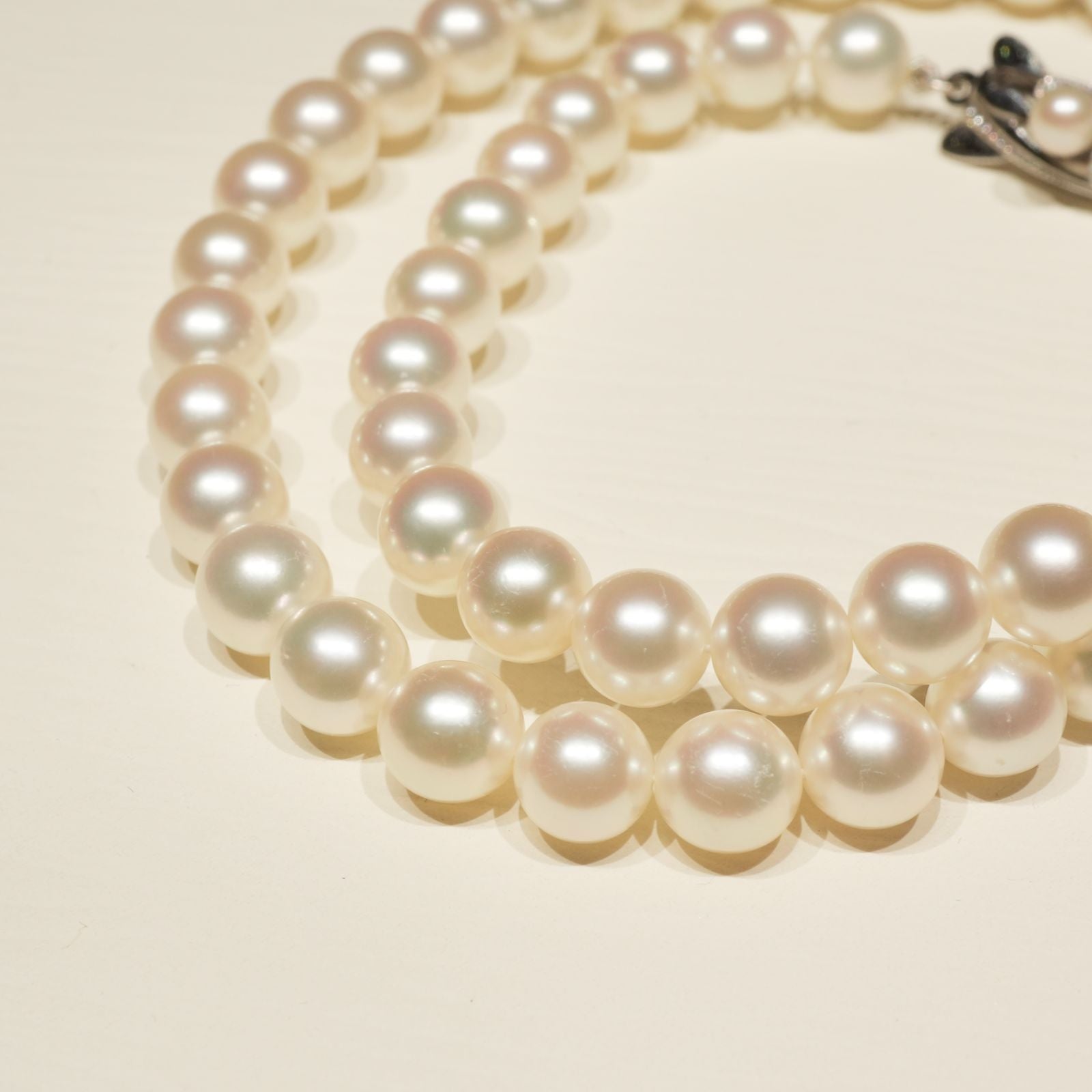 Mikimoto K14WG Akoya Pearl Necklace featuring white pearls sized 6.6 to 6.9 mm on a sterling white gold chain