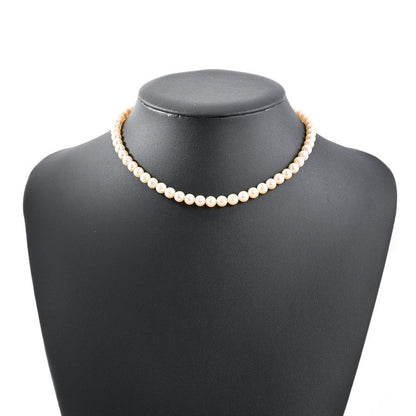 MIKIMOTO pearl necklace featuring white pearls on a 39.5 cm silver chain weighing 23.1 grams