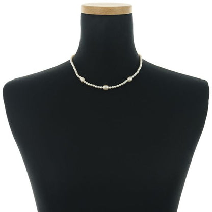 Mikimoto baby pearl necklace in 18k yellow gold featuring pearls sized 3.5-7.2mm on a 40cm chain