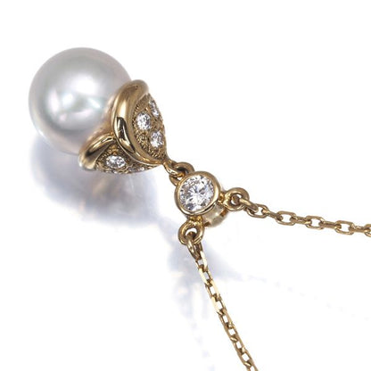 Mikimoto pearl necklace with 8.7mm pearl, diamonds, and 18K yellow gold chain 40cm long