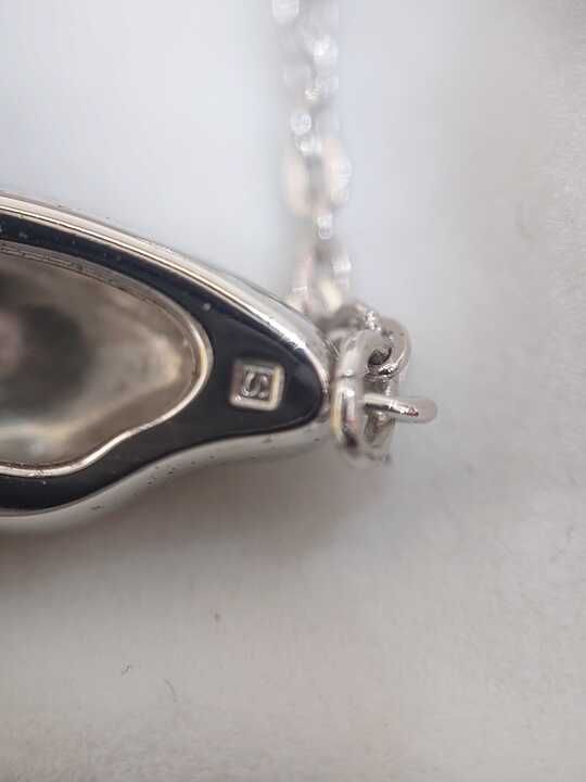 Mikimoto silver necklace with a pearl and butterfly pendant on a 41 cm chain