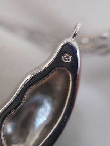Mikimoto silver necklace with a pearl and butterfly pendant on a 41 cm chain