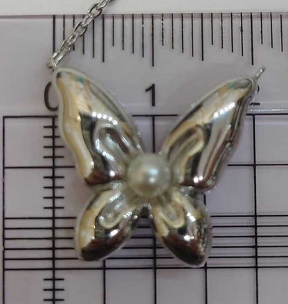 Mikimoto silver necklace with a pearl and butterfly pendant on a 41 cm chain