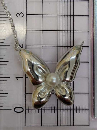 Mikimoto silver necklace with a pearl and butterfly pendant on a 41 cm chain