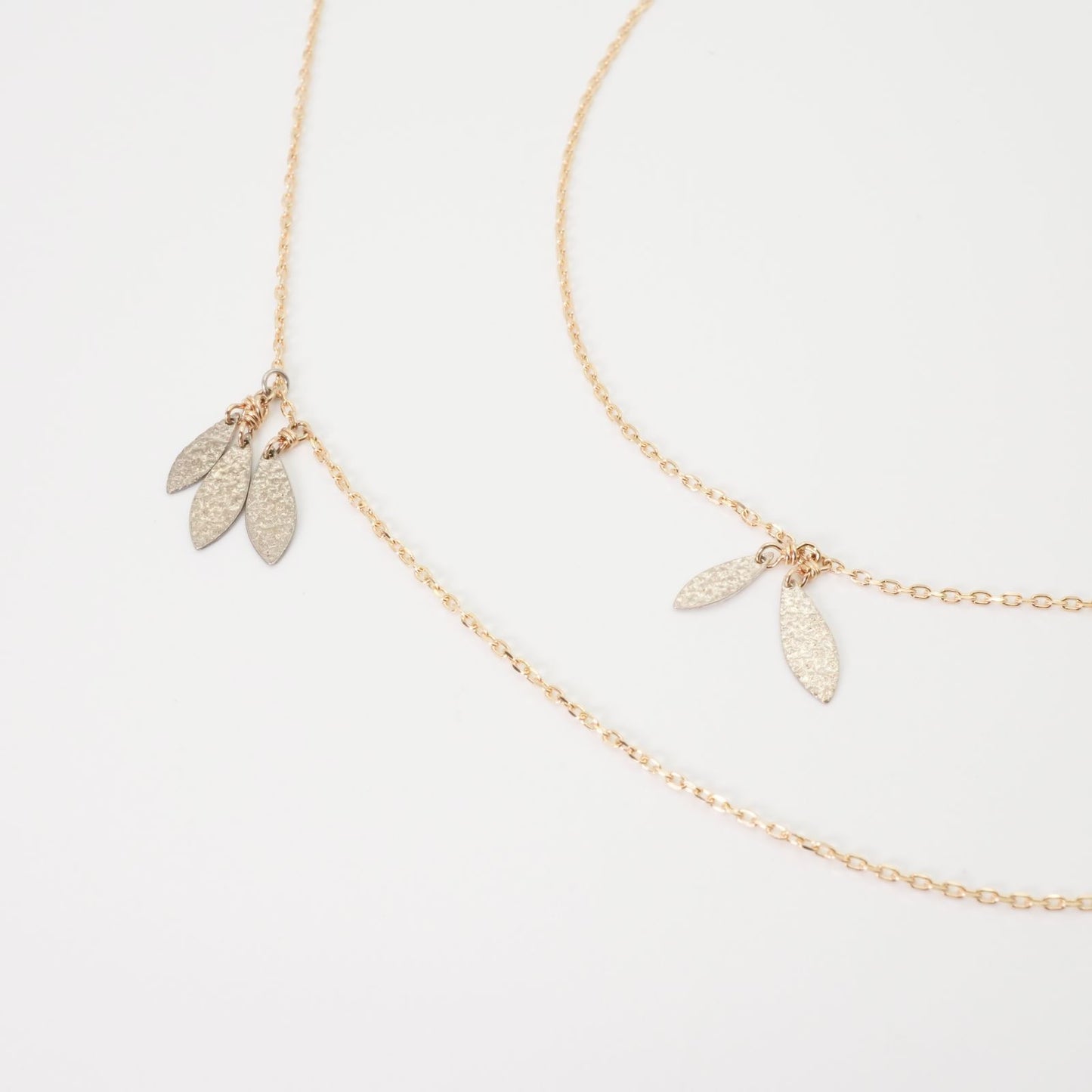 Agate Leaf Combined Long Necklace crafted from K10 gold and silver shown on white background