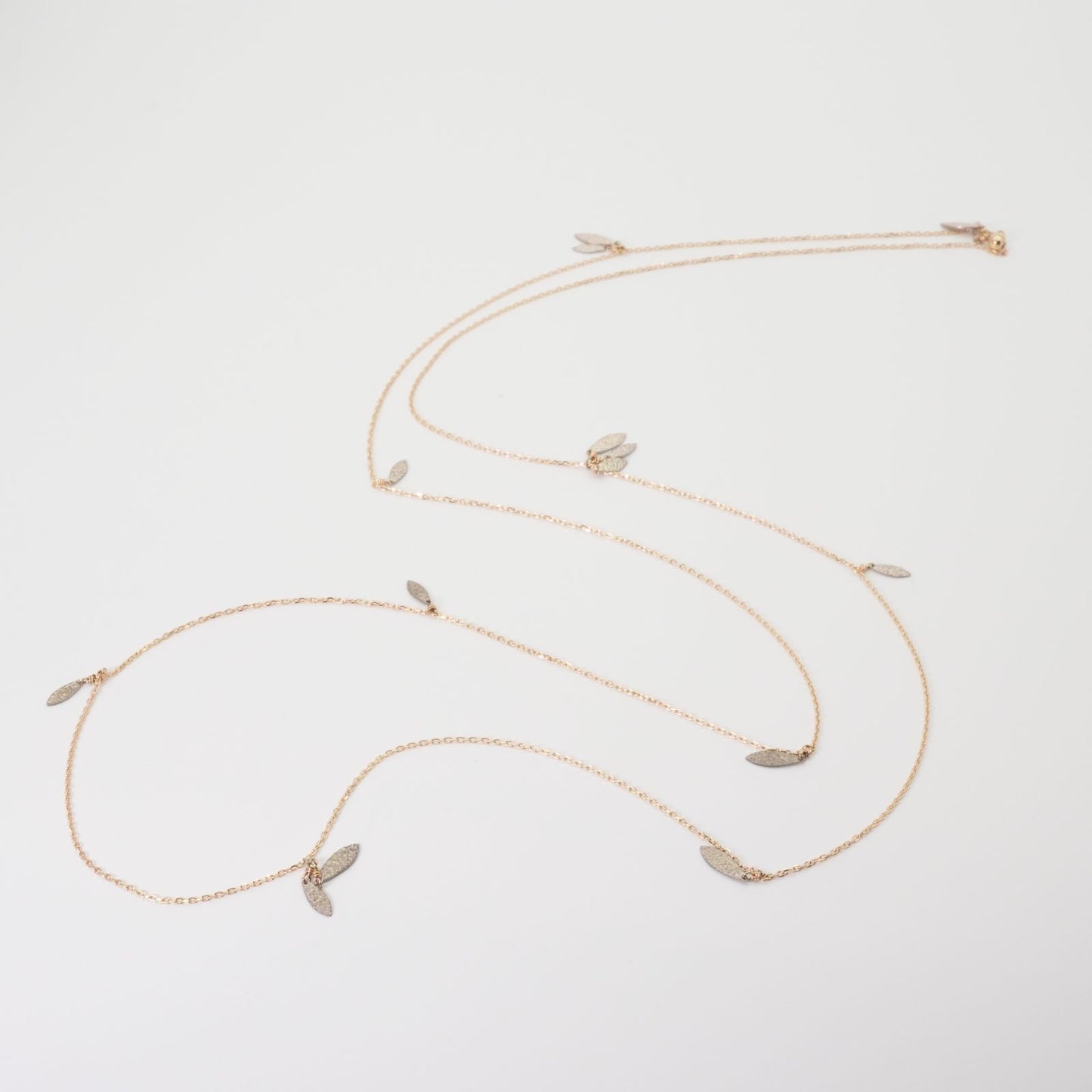 Agate Leaf Combined Long Necklace crafted from K10 gold and silver shown on white background