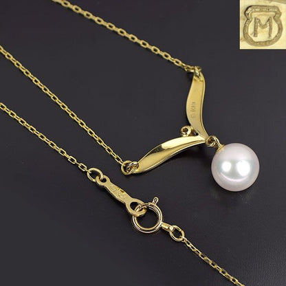 Mikimoto K18YG Akoya pearl pendant necklace with a 7.2 mm pearl and diamond accents on a 42 cm gold chain