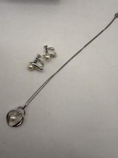 Used Mikimoto Akoya pearl necklace and matching earrings set in sterling silver with M within M logo