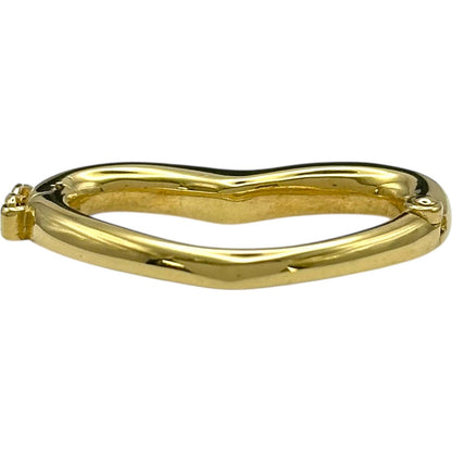 Mikimoto Heart Top Gold 750 jewelry piece for ladies sized 17.8 mm by 28 mm weighing 4.7 grams
