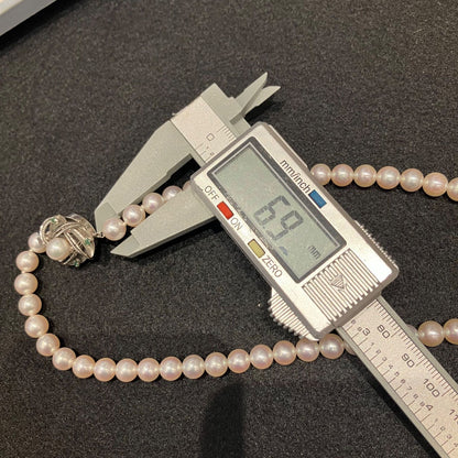 K14WG engraved genuine Akoya pearl necklace with 75cm length and pearls measuring approximately 6.9-7.2mm diameter