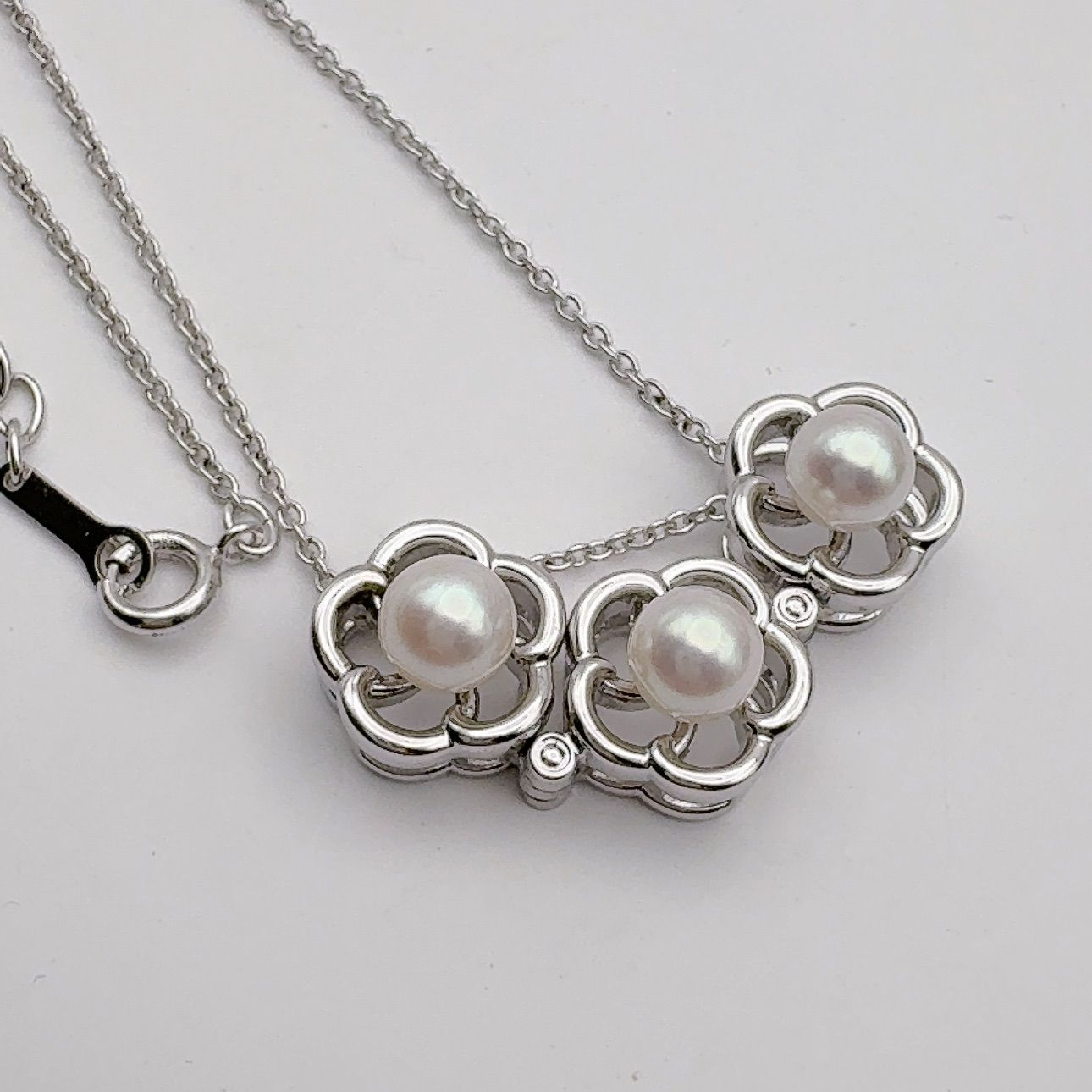 Tasaki pearl necklace featuring 6.2mm pearls, 41.5cm chain, and 1.1cm by 3.4cm pendant