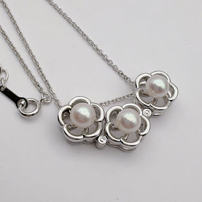 Tasaki pearl necklace featuring 6.2mm pearls, 41.5cm chain, and 1.1cm by 3.4cm pendant