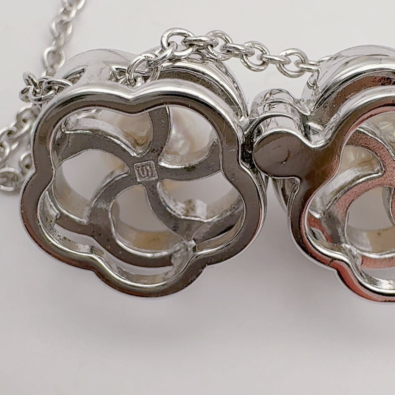 Tasaki pearl necklace featuring 6.2mm pearls, 41.5cm chain, and 1.1cm by 3.4cm pendant