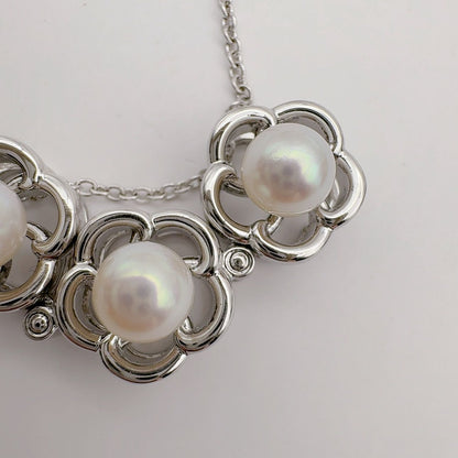 Tasaki pearl necklace featuring 6.2mm pearls, 41.5cm chain, and 1.1cm by 3.4cm pendant