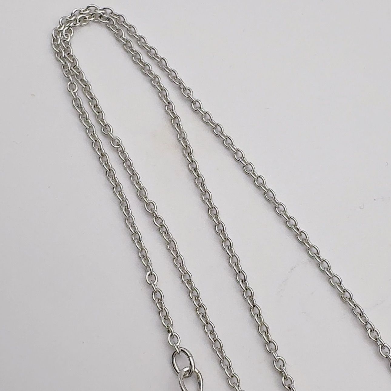 Tasaki pearl necklace featuring 6.2mm pearls, 41.5cm chain, and 1.1cm by 3.4cm pendant