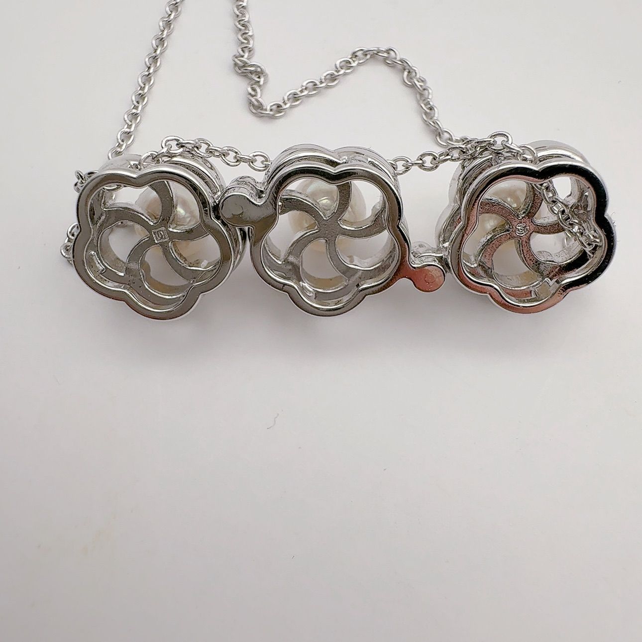 Tasaki pearl necklace featuring 6.2mm pearls, 41.5cm chain, and 1.1cm by 3.4cm pendant