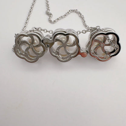 Tasaki pearl necklace featuring 6.2mm pearls, 41.5cm chain, and 1.1cm by 3.4cm pendant
