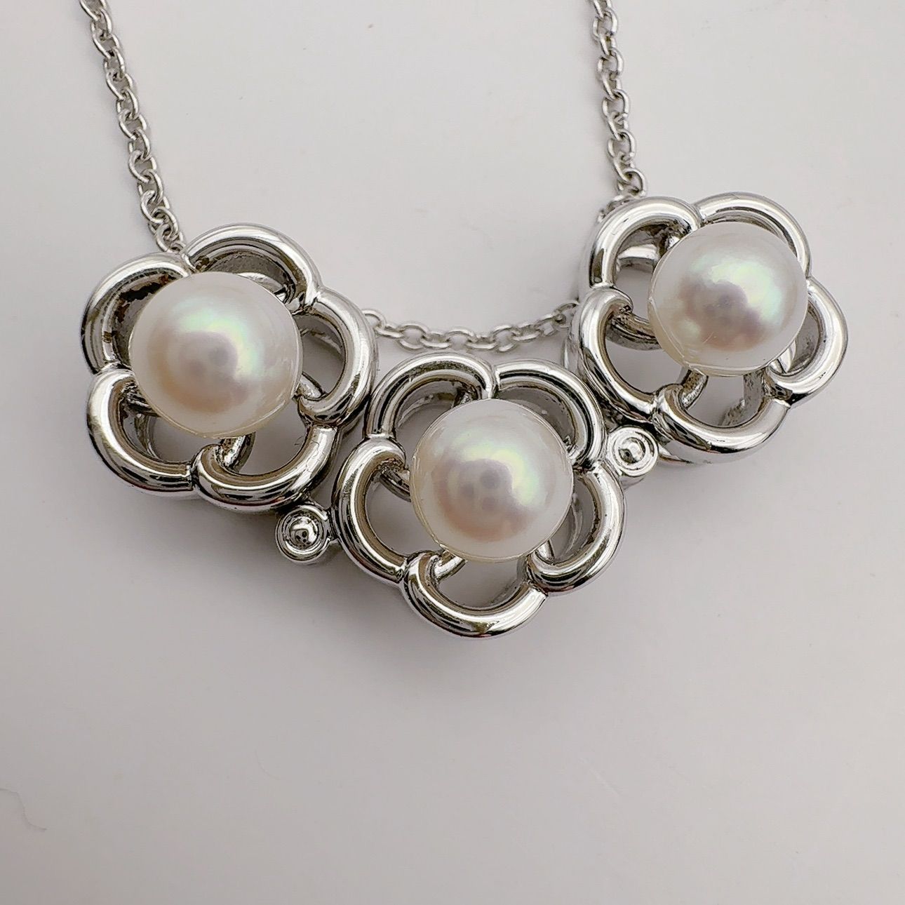 Tasaki pearl necklace featuring 6.2mm pearls, 41.5cm chain, and 1.1cm by 3.4cm pendant
