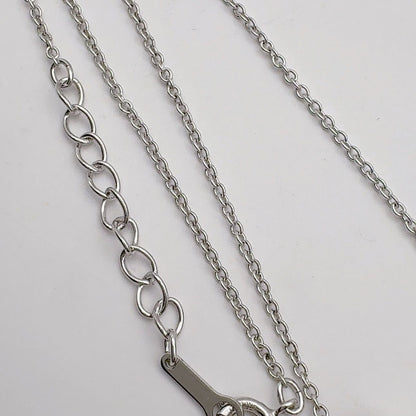 Tasaki pearl necklace featuring 6.2mm pearls, 41.5cm chain, and 1.1cm by 3.4cm pendant