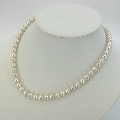 Beautiful Mikimoto pearl necklace with silver chain, model 24-2158M, detailed pearls visible
