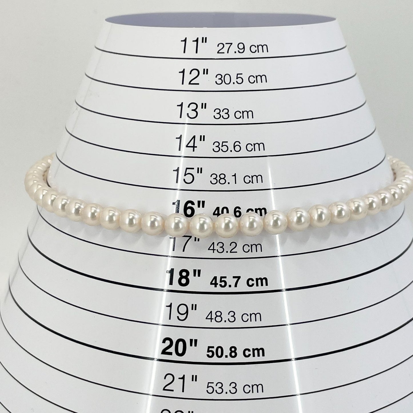 Beautiful Mikimoto pearl necklace with silver chain, model 24-2158M, detailed pearls visible