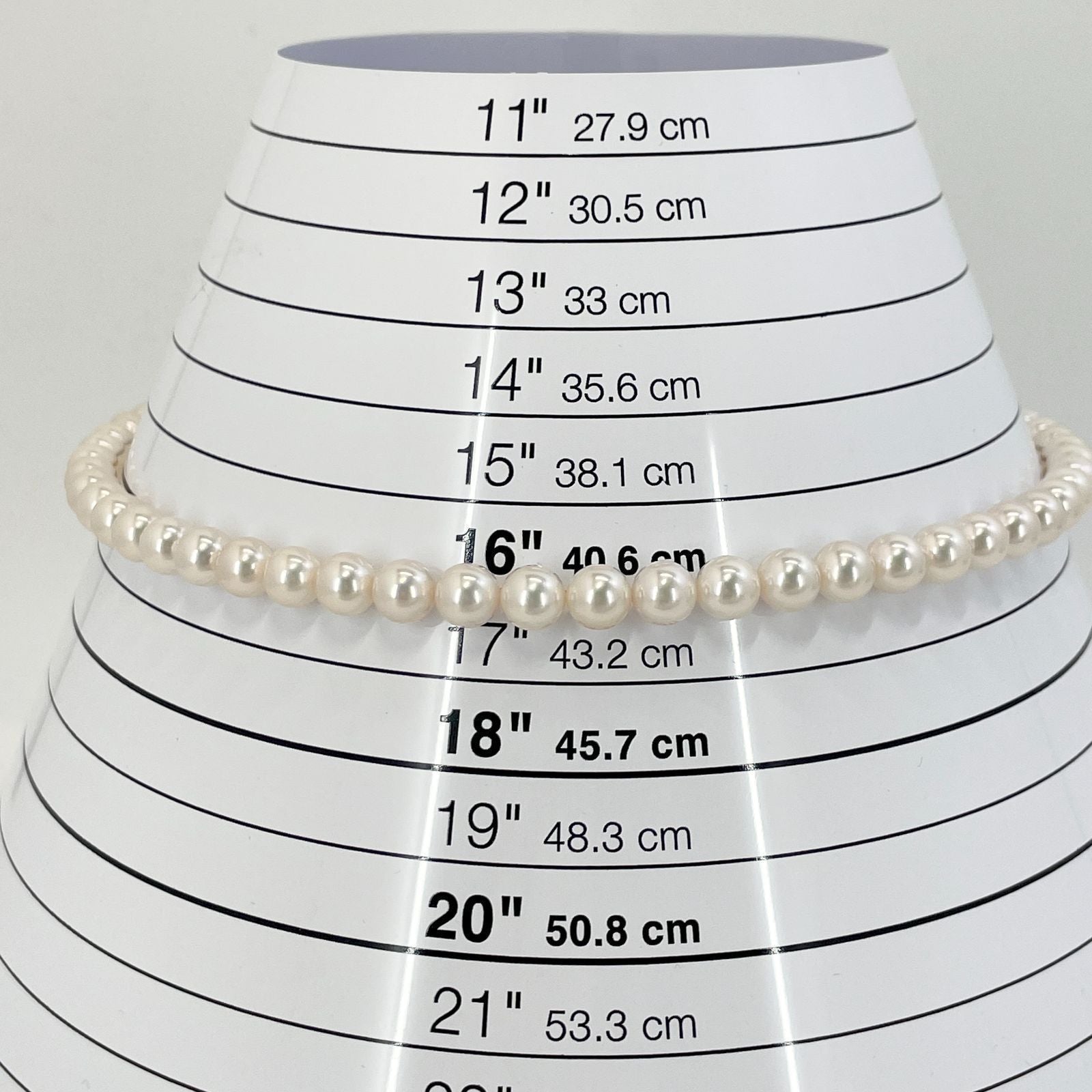 Beautiful Mikimoto pearl necklace with silver chain, model 24-2158M, detailed pearls visible