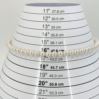 Beautiful Mikimoto pearl necklace with silver chain, model 24-2158M, detailed pearls visible