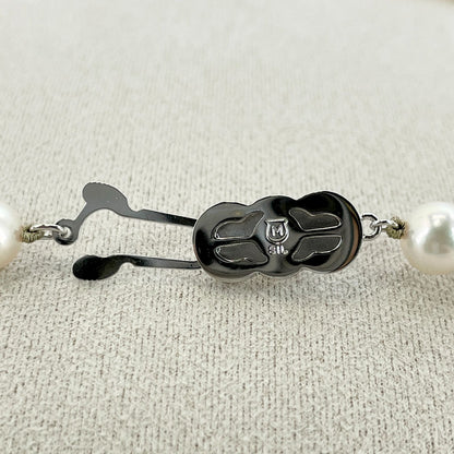 Beautiful Mikimoto pearl necklace with silver chain, model 24-2158M, detailed pearls visible