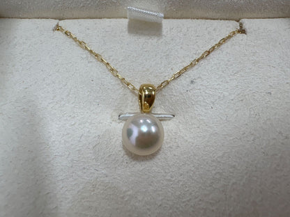 MIKIMOTO pearl necklace with 6.8mm pearls on a 40cm yellow gold chain