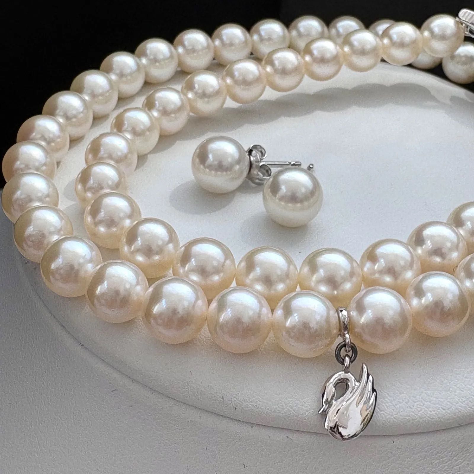 Tasaki Akoya pearl necklace and earrings set with swan charm and certificate