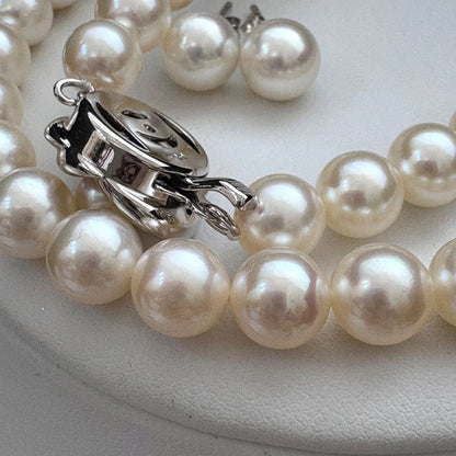 Tasaki Akoya pearl necklace and earrings set with swan charm and certificate
