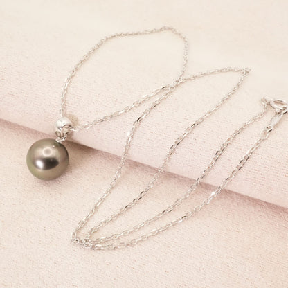 Mikimoto K18WG black cultured pearl necklace model 25-512S on white background