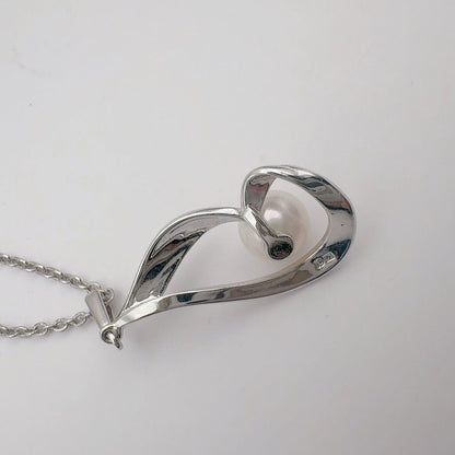 Mikimoto Necklace with 6.2mm pearl pendant and 40.5cm chain in silver tone