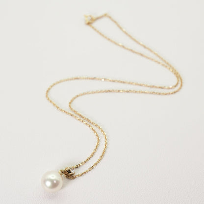 Mikimoto K18 necklace featuring an 8.3mm Akoya pearl and diamond accents, model 25-1023S