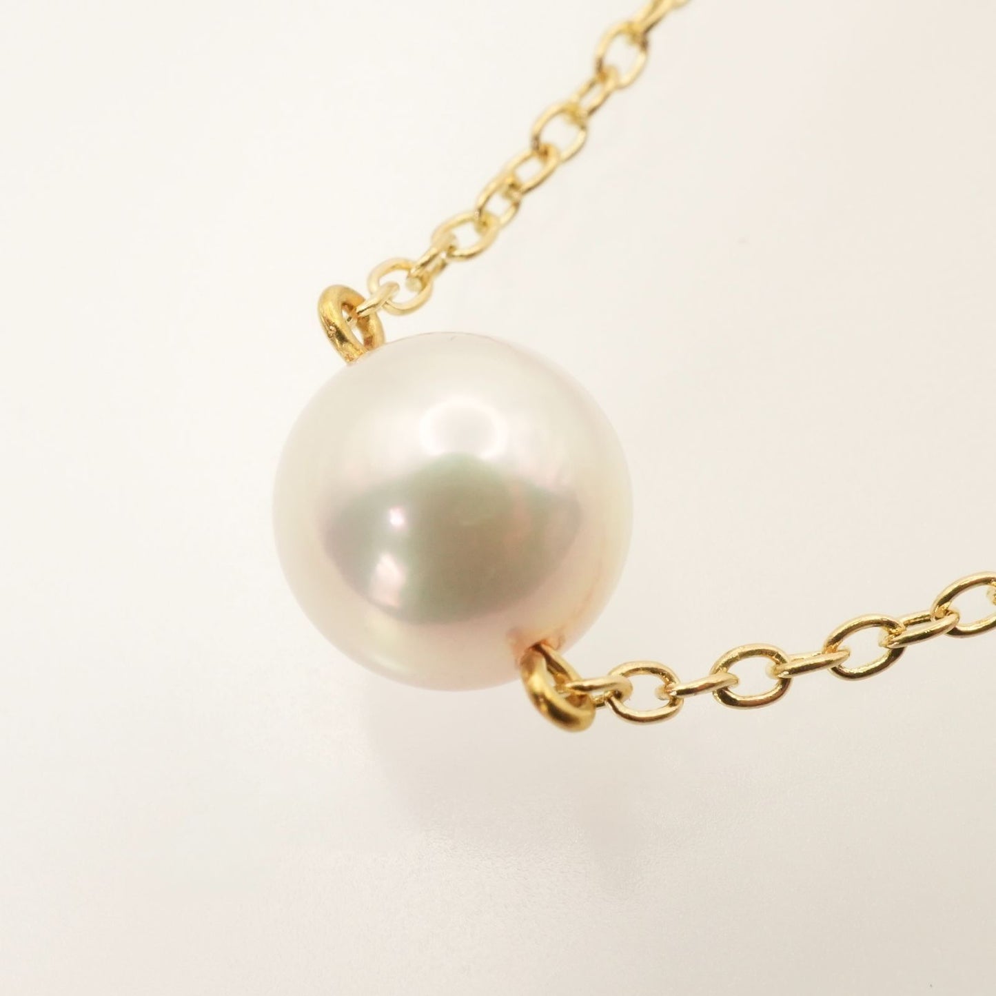 Mikimoto K18 Akoya pearl necklace model 25-420S featuring a single pearl on a gold chain