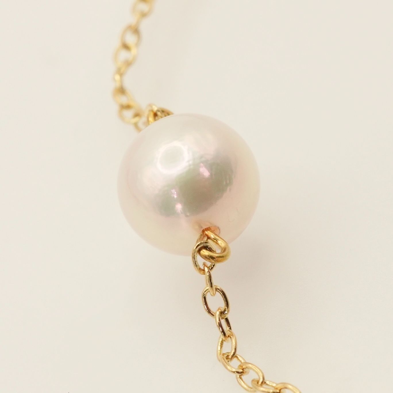 Mikimoto K18 Akoya pearl necklace model 25-420S featuring a single pearl on a gold chain