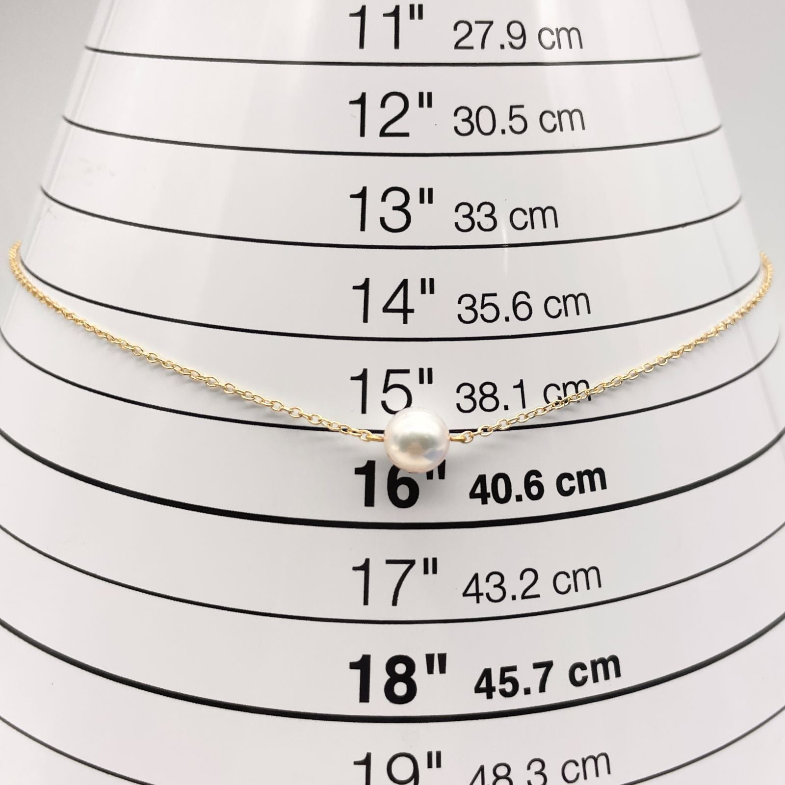 Mikimoto K18 Akoya pearl necklace model 25-420S featuring a single pearl on a gold chain