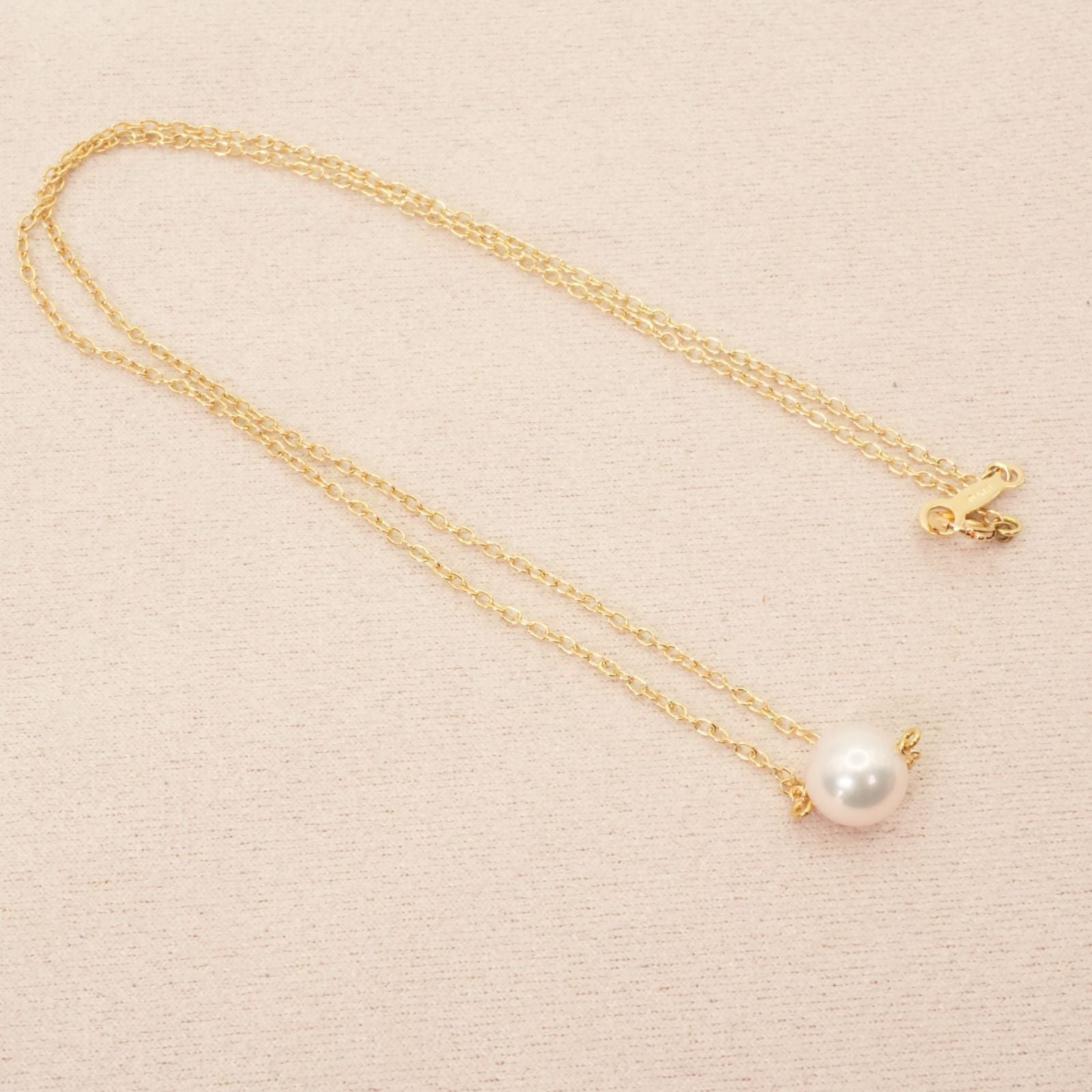 Mikimoto K18 Akoya pearl necklace model 25-420S featuring a single pearl on a gold chain
