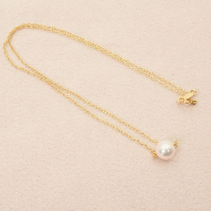 Mikimoto K18 Akoya pearl necklace model 25-420S featuring a single pearl on a gold chain