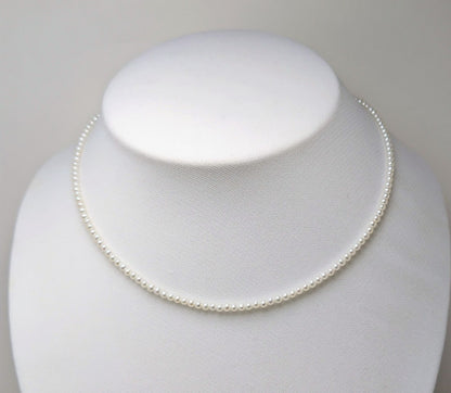 Baby 3mm white Akoya and freshwater pearl necklace with semi-round pearls and good luster