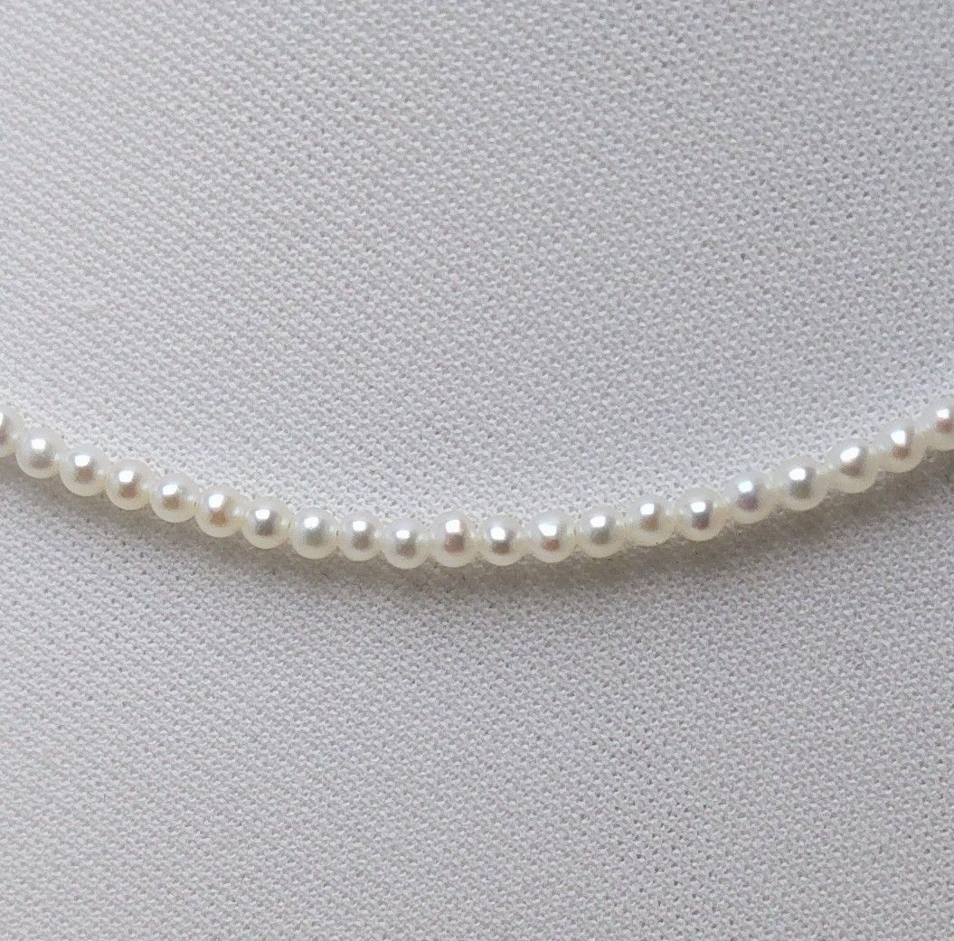 Baby 3mm white Akoya and freshwater pearl necklace with semi-round pearls and good luster