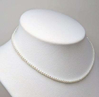 Baby 3mm white Akoya and freshwater pearl necklace with semi-round pearls and good luster