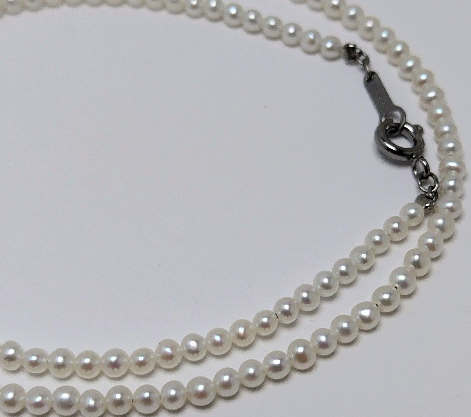 Baby 3mm white Akoya and freshwater pearl necklace with semi-round pearls and good luster