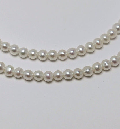 Baby 3mm white Akoya and freshwater pearl necklace with semi-round pearls and good luster