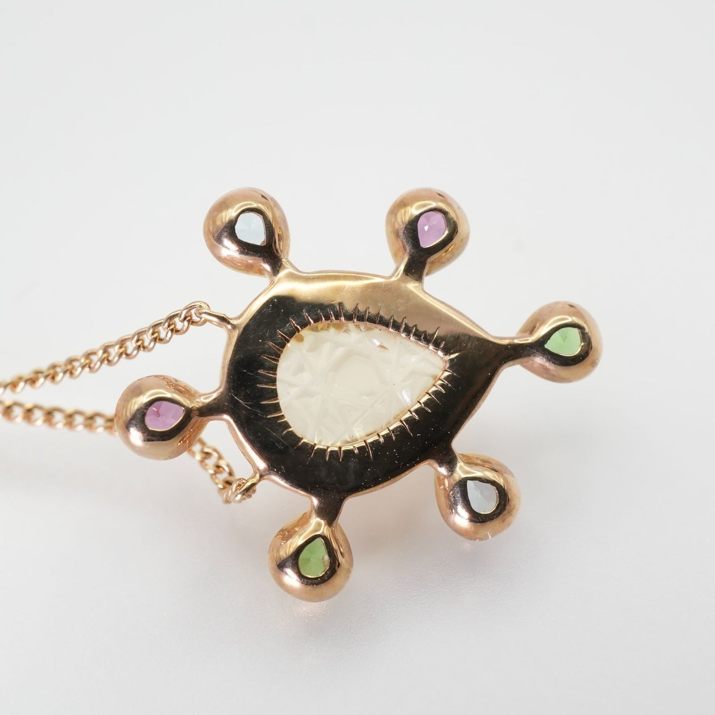 Agete K10 multi-color stone necklace model 24-4457 laid flat showing elegant design
