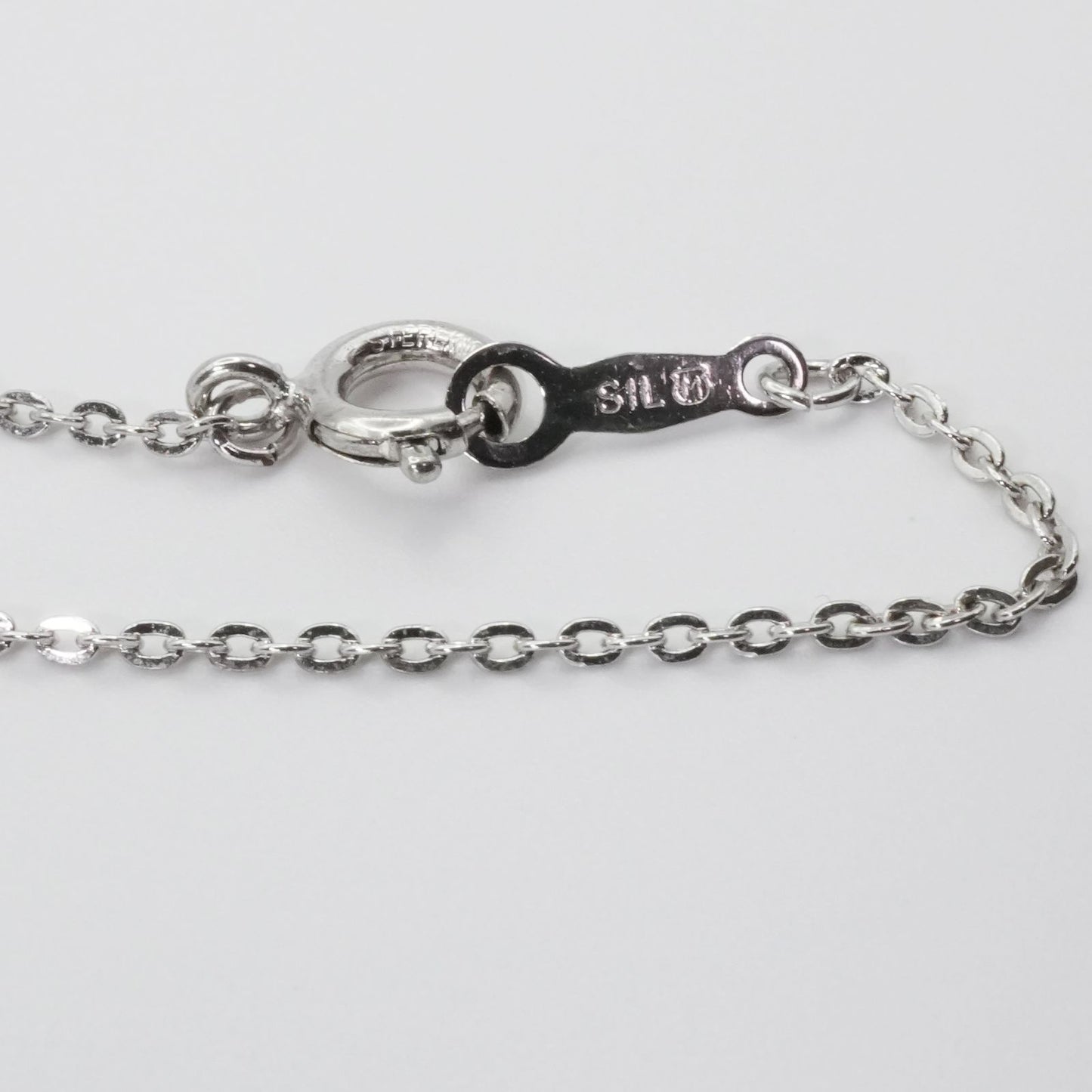 Mikimoto Silver Akoya Pearl Pendant Necklace with a single white pearl on a silver chain