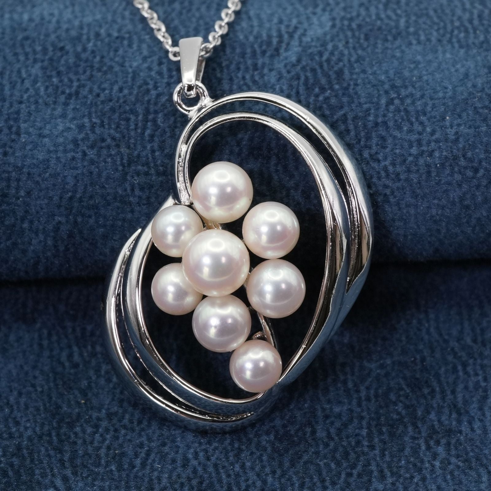 Mikimoto Silver Akoya Pearl Pendant Necklace with a single white pearl on a silver chain