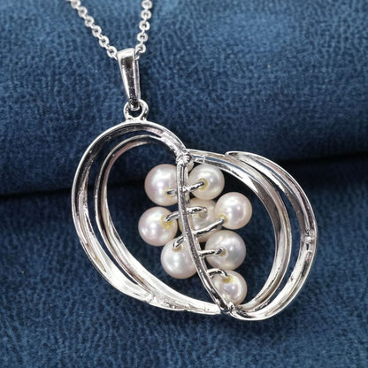 Mikimoto Silver Akoya Pearl Pendant Necklace with a single white pearl on a silver chain