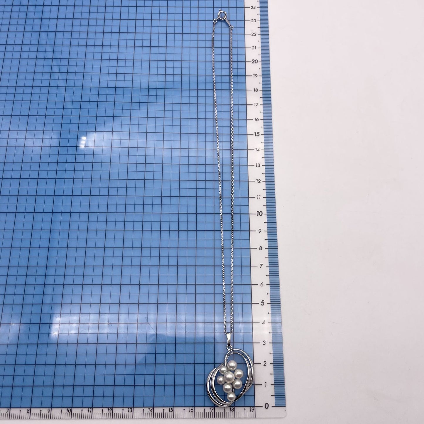 Mikimoto Silver Akoya Pearl Pendant Necklace with a single white pearl on a silver chain
